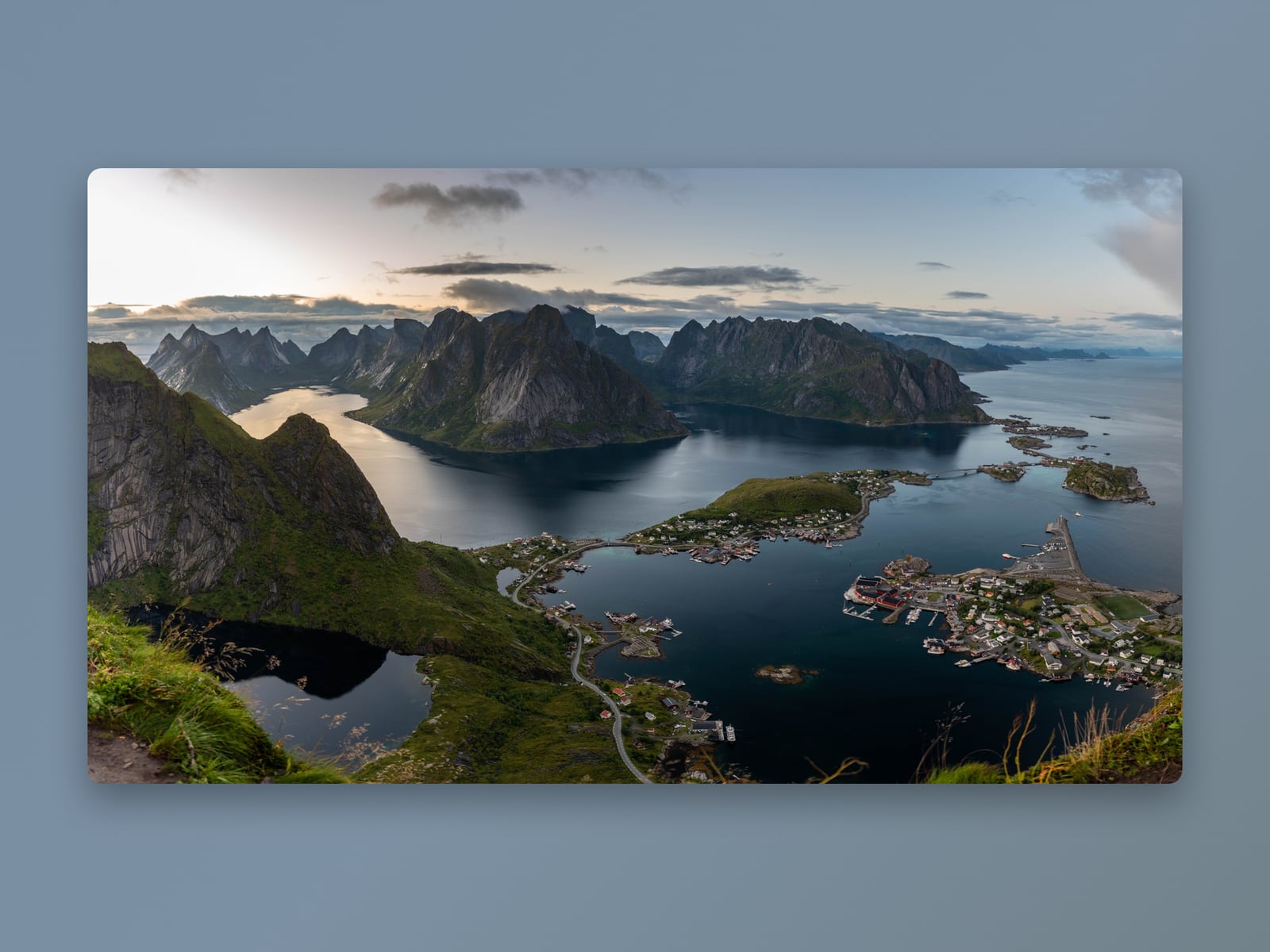 The same photo on an Auto-match background: a muted fjord blue taken from the photo’s own colours.